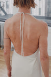 BASERANGE Adjustable Strap Apron Dress Collection, from Portugal. Color: Off-white (BAS-DRAP-RS-000-MIBAI)